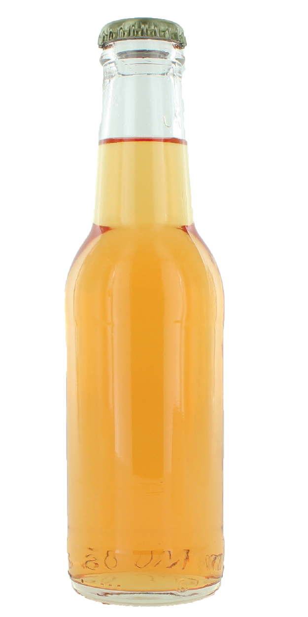 Orange colored beverage in a glass bottle