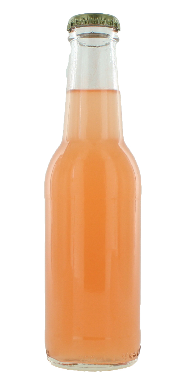 Orange colored beverage in a glass bottle
