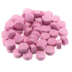 Pink pressed tablets