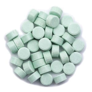 Bright green pressed tablets