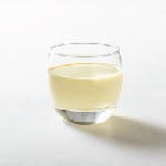 Yellow yoghurt drink in a glass