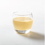 Yellow yoghurt drink in a glass