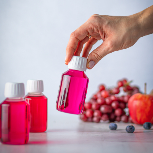 EXBERRY bottles with pink color